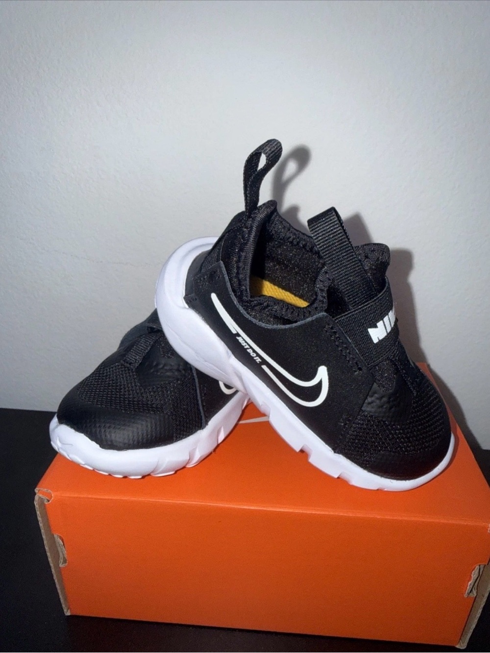 Nike Black and White Kids Slip-On Sneakers